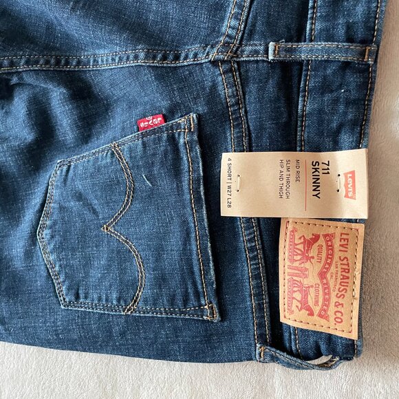 NEW. Women's Size 4 short, Levi's 711,  Distressed, Dark Wash, Hypersoft jeans. - Picture 14 of 15